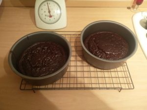 The cakes in the tins but cooled