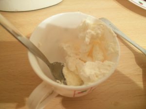 A small amount of the whipping cream in a separate cup