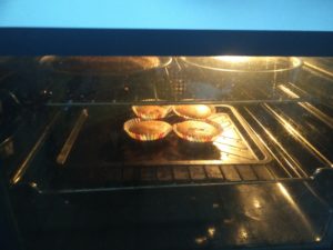 The cakes have baked and risen in the oven
