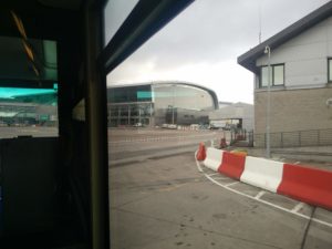 A partial view of Dublin Airport terminal building from the shuttle bus