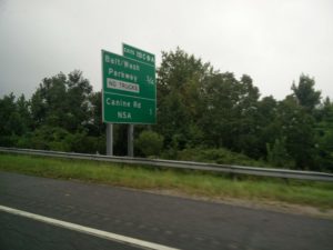 A road sign pointing to the National Security Agency