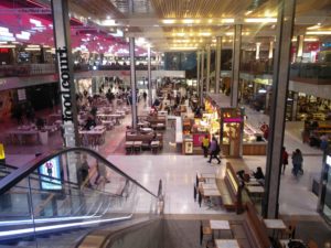 A view over the food court area at the Westfield Center, showing a large number of tables