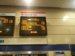 A departures board at Stratford station