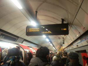 The departures board at London Euston underground station showing 10 minutes before 7pm